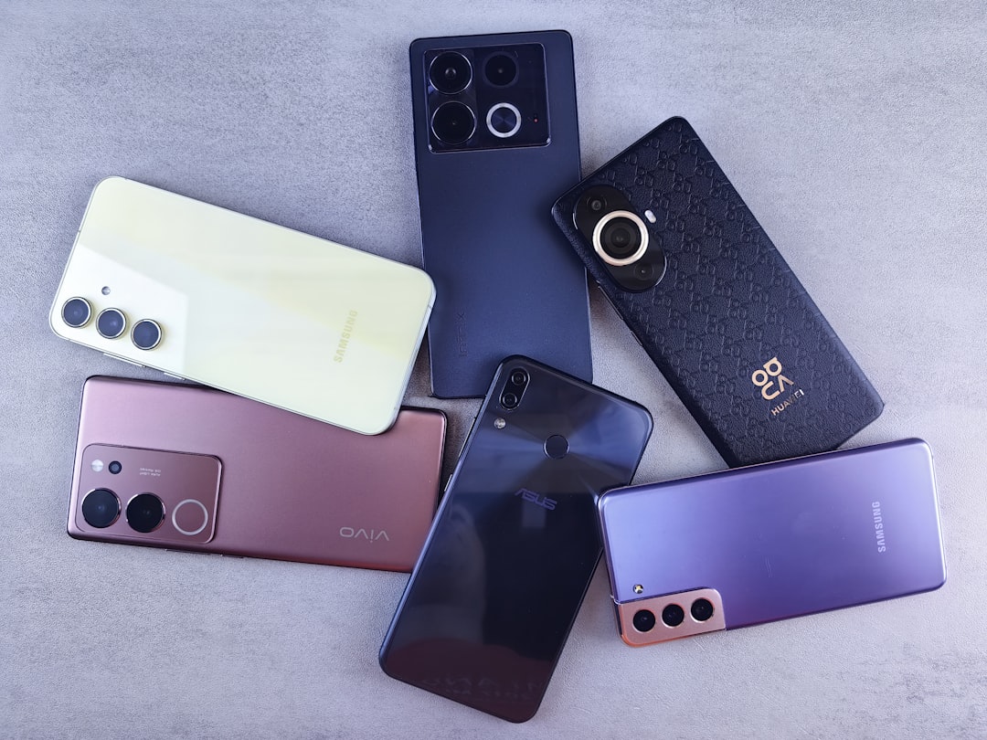 a-group-of-cell-phones-sitting-next-to-each-other-b7kuzqepwvu