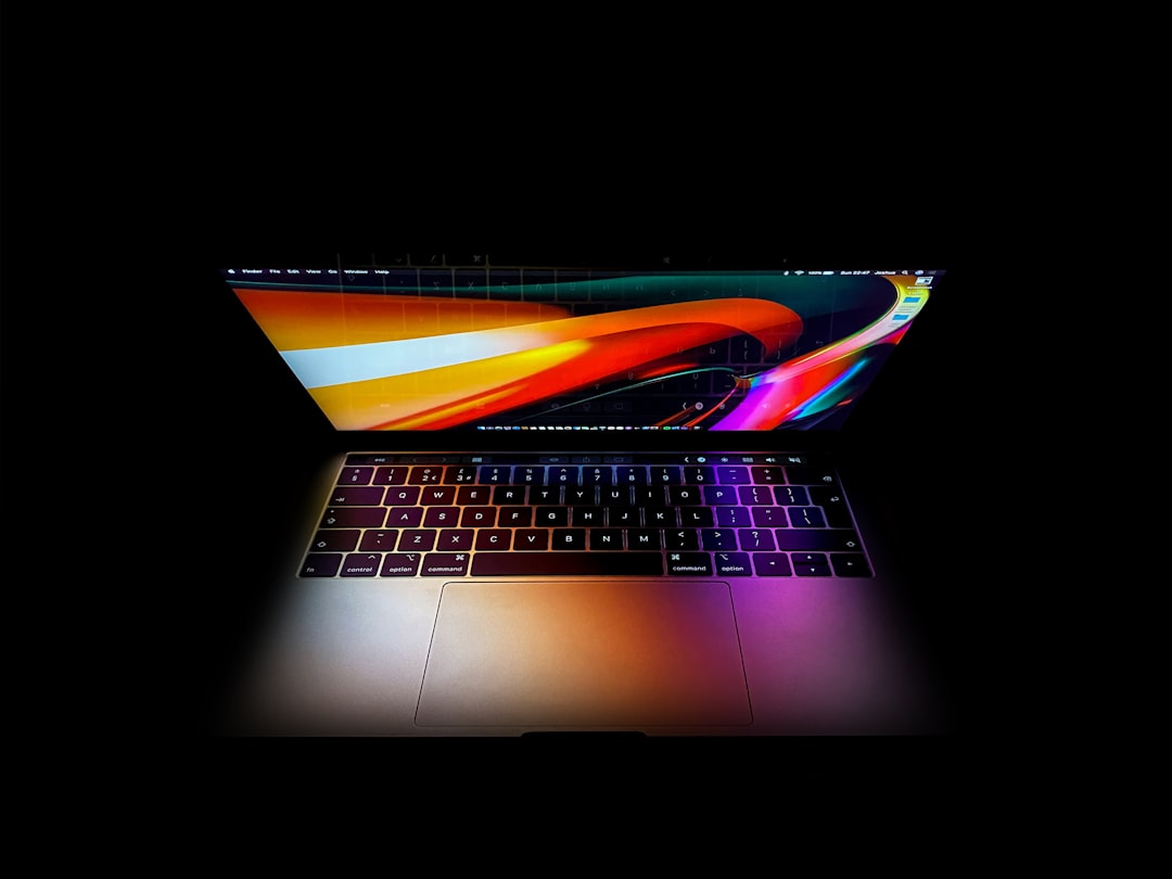 macbook-pro-turned-on-displaying-red-blue-and-yellow-lights-1ssfrozgifk
